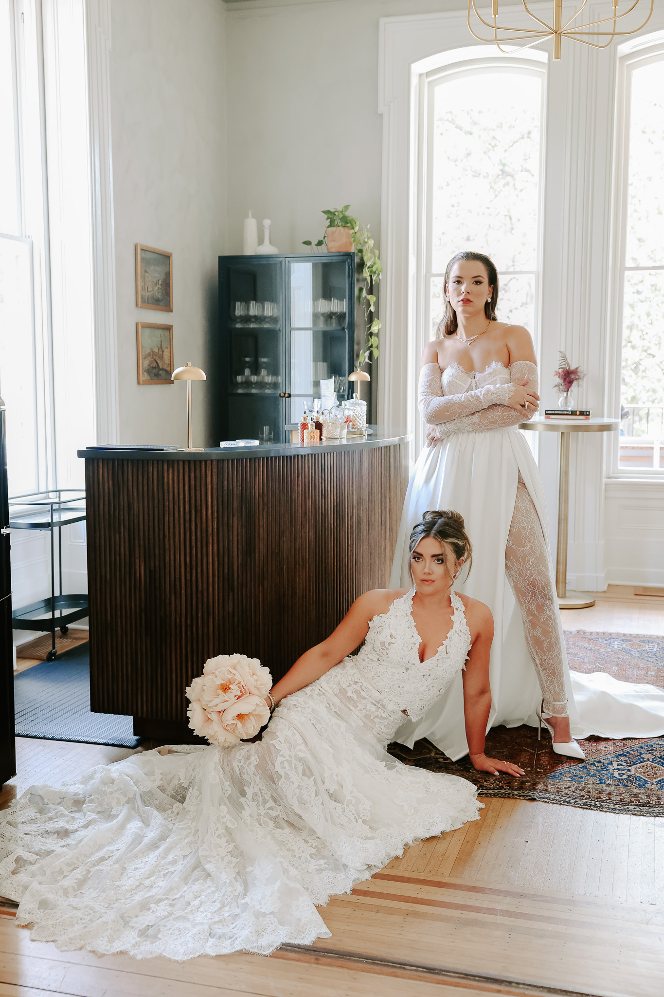 a person in a wedding dress laying on the floor