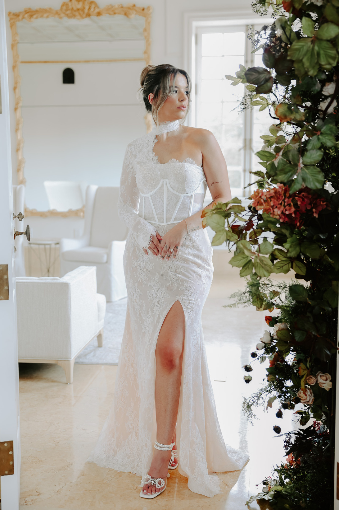 female in sexy bridal gown at an estate